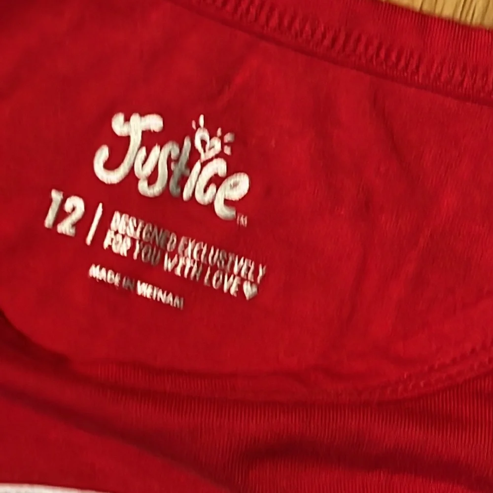 Never worn Justice Long sleeve top, size 12